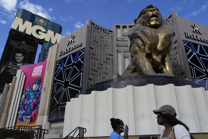 People walk by the MGM Grand hotel-casino in Las Vegas on Wednesday.