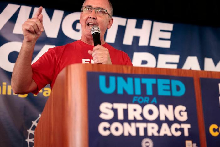 UAW President Shawn Fain speaks as UAW members and their supporters gather for Solidarity Sunday at the UAW Region 1 office in Warren, Mich., on Aug. 20. The UAW has started an unprecedented strike against all three big automakers.