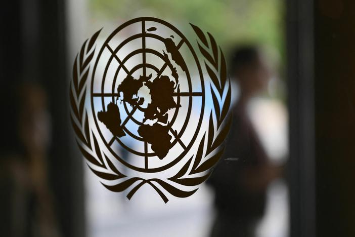 The U.N. logo on a door at the United Nations headquarters in New York. President Biden and other world leaders will meet there next week for the annual general assembly.