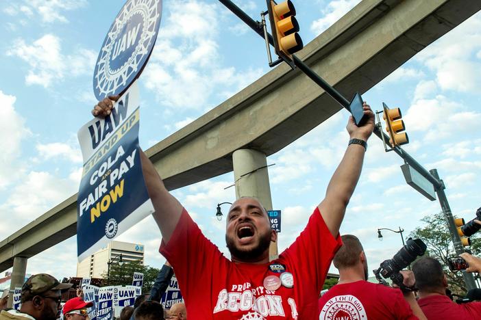 Members of the United Auto Workers (UAW) union march through the streets of downtown Detroit following a rally on the first day of the UAW strike in Detroit, Michigan, on September 15, 2023. Workers at the "Big Three" US auto manufacturers went on strike on September 15, 2023.