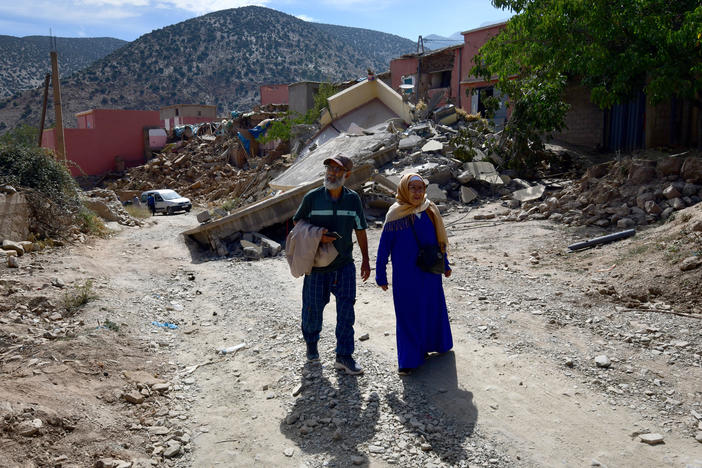 Brother and sister Boujemaa and Aicha Ounasser return home to their birthplace in the Atlas Mountains on Sept. 12 to view the rubble of the devastating earthquake in Tnirte, Morocco.