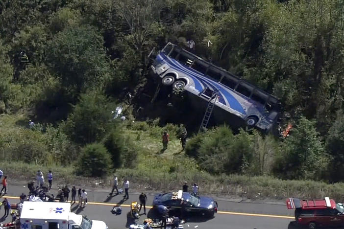 Emergency responders work the scene of a fatal bus crash, in Wawayanda, N.Y., Thursday, Sept. 21, 2023.