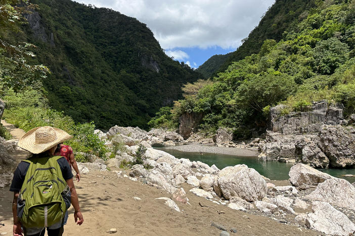 The giant white marble boulders that line the Agos River just north of the Philippine village of Daraitan are sacred to the Indigenous Dumagat people. They use the boulders to perform rituals to ward off sickness and keep their village safe. If the Kaliwa Dam is built upriver, the Dumagat say these rocks will be destroyed to make way for the increased water flow.