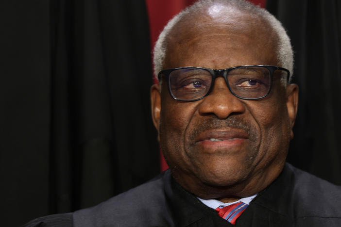 Supreme Court Associate Justice Clarence Thomas poses for an official portrait at the East Conference Room of the Supreme Court building last year.