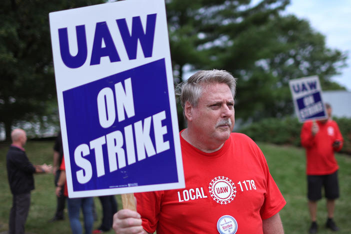 UAW workers picket outside of the Stellantis Mopar parts facility in Naperville, Ill., on Sept. 22, 2023. The UAW strike against Big Three automakers may not have much of an impact on car shoppers, though that could change.