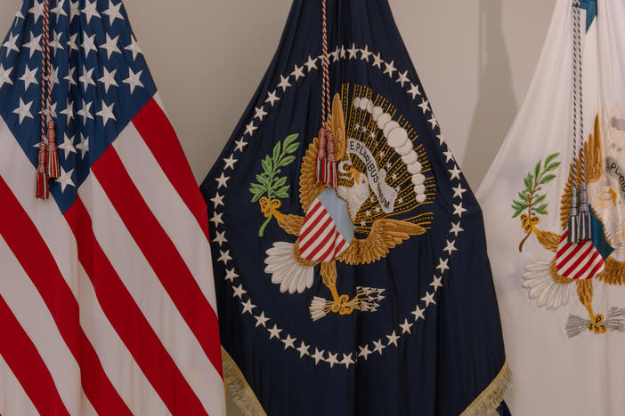 The presidential flag (center) is hand embroidered.