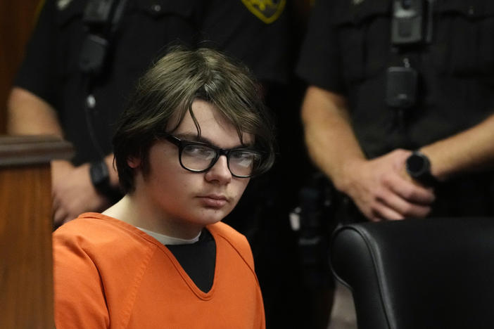 Seventeen-year-old Ethan Crumbley, seen in a Pontiac, Mich., courtroom in July, was 15 when he shot and killed four people and wounded seven others during a shooting at Oxford High School in Oxford, Mich. Friday's hearing took place over Zoom.