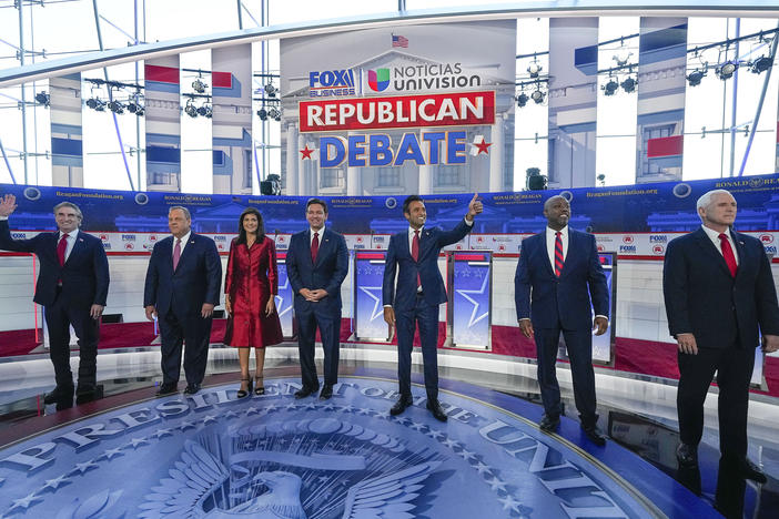 Republican presidential candidates, from left, North Dakota Gov. Doug Burgum, former New Jersey Gov. Chris Christie, former U.N. Ambassador Nikki Haley, Florida Gov. Ron DeSantis, entrepreneur Vivek Ramaswamy, Sen. Tim Scott, R-S.C., and former Vice President Mike Pence, at a debate hosted by FOX Business and Univision, Wednesday at the Ronald Reagan Presidential Library in Simi Valley, Calif.