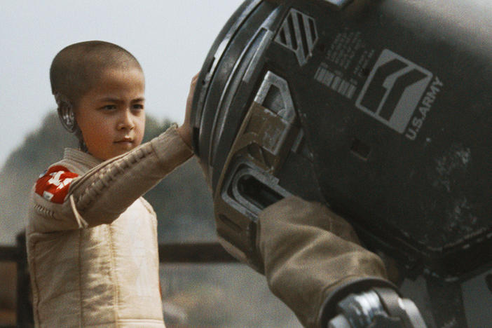 Madeleine Yuna Voyles plays Alphie, a pensive young robot child in <em>The Creator. </em>
