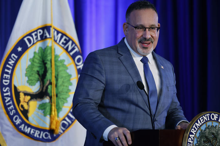 "There is nothing valuable about being ripped off or sold on a worthless degree," U.S. Education Secretary Miguel Cardona said at a press briefing announcing the final rule. He is shown here in January 2022 in Washington, D.C.