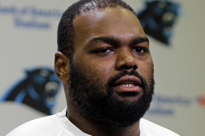 Michael Oher speaks to the media during the first day of the Carolina Panthers' offseason conditioning program in Charlotte, N.C., April 20, 2015. Oher, the former NFL tackle known for the movie "The Blind Side," filed a petition Aug. 14, 2023, in a Tennessee court accusing Sean and Leigh Anne Tuohy of having him sign papers making them his conservators rather than his adoptive parents.