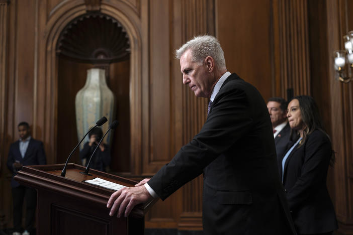 House Speaker Kevin McCarthy, R-Calif., pauses as he addresses reporters about efforts to pass appropriations bills and avert a looming government shutdown at the U.S. Capitol on Friday. He is joined at right by House Homeland Security Chair Mark Green, R-Tenn., and Rep. Monica de la Cruz, R-Texas.