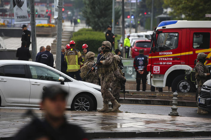 Turkish security forces cordon off an area after an explosion in Ankara on Sunday. A suicide bomber detonated an explosive device in the heart of the Turkish capital, hours before parliament was scheduled to reopen after a summer recess. A second assailant was killed in a shootout with police.