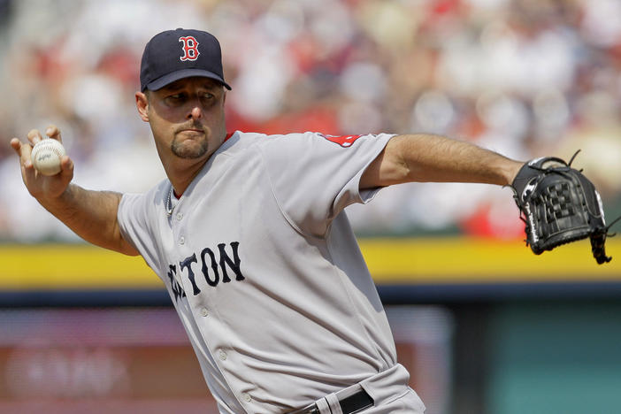 Boston Red Sox starter Tim Wakefield works in the second inning of a baseball game against the Atlanta Braves in Atlanta, June 27, 2009. Wakefield has died at age 57.
