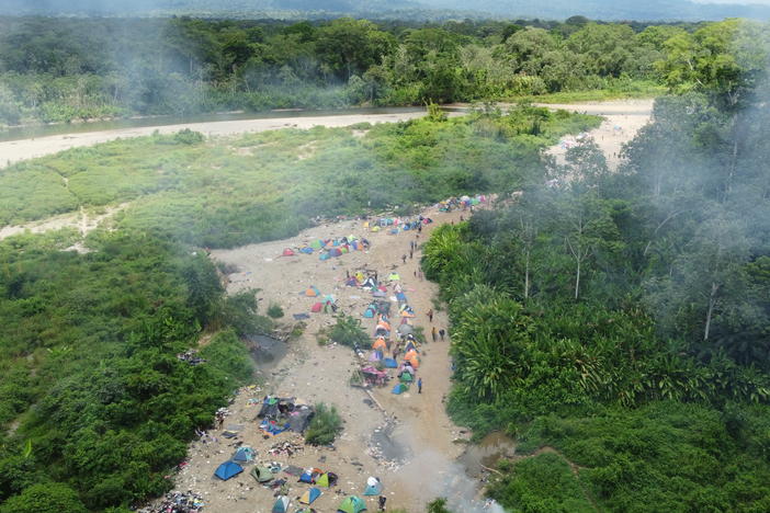 Hundreds of people sleep in tents each day outside Bajo Chiquito, the first village that migrants encounter in Panama after making the grueling trek across the Darién jungle.