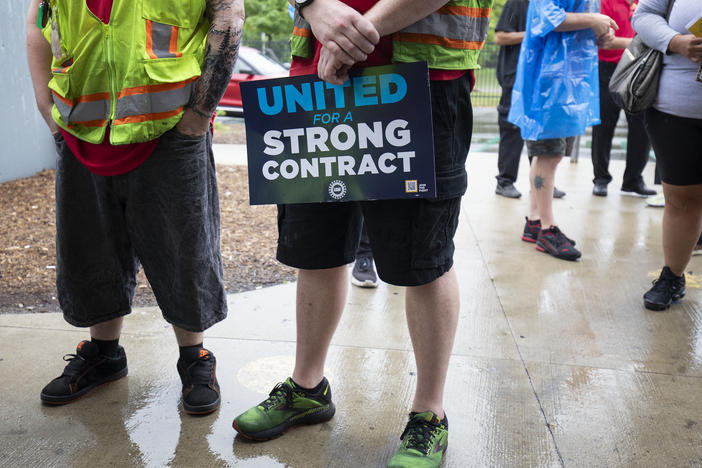 Ford workers meet with United Auto Workers President Shawn Fain at the Ford Michigan Assembly Plant in Wayne, Mich., on July 12, 2023. The UAW is fighting hard to regain the things they gave up before and during the 2008 Global Financial Crisis.