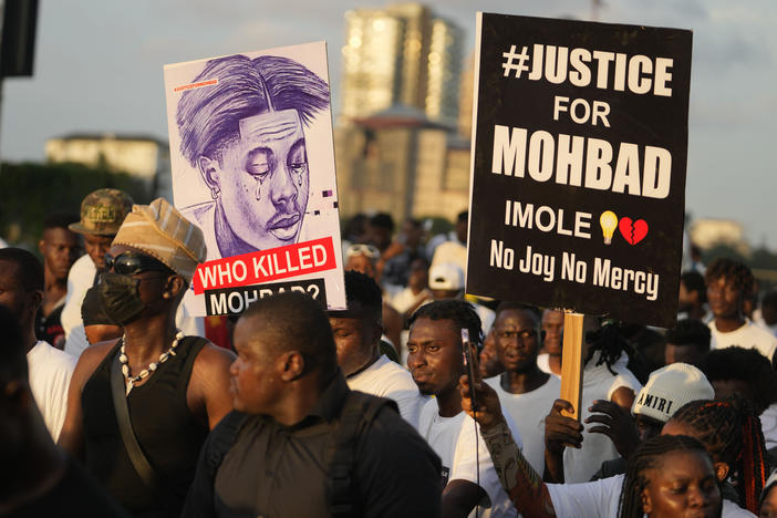 People take part in a protest on Sept. 21 in Lagos, Nigeria, to demand justice following the death of Afrobeats star Mohbad.