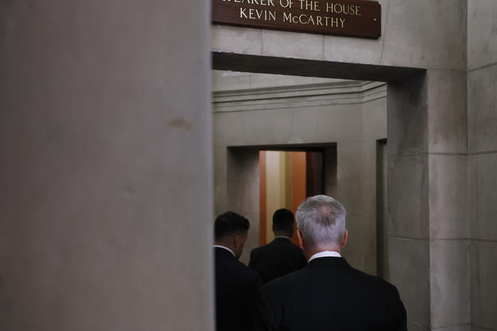 Rep. Kevin McCarthy, R-Calif., enters his office at the U.S. Capitol on Monday, the day before he was voted out as speaker.