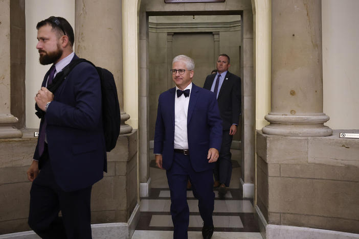 House speaker pro tempore Patrick McHenry (center) walks out of the offices of former Speaker of the House Kevin McCarthy on Wednesday. The process is underway to replace McCarthy after he was ousted from the speakership on Tuesday.