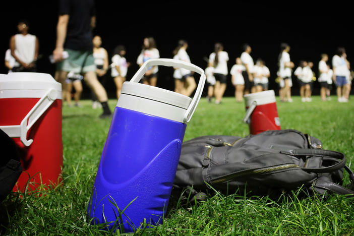 Marching bands are getting creative to beat the heat of climate change. Some changes include covering brass instruments under direct sunlight, scheduling frequent water breaks and time to put on extra sunscreen, no longer wearing traditional marching band uniforms at games and practicing before sunrise or after sunset.