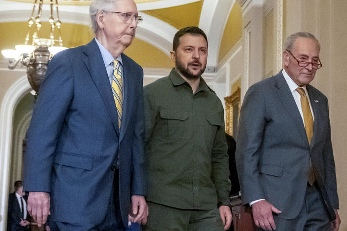 Ukrainian President Volodymyr Zelenskyy (center) walks with Senate Minority Leader Mitch McConnell, R-Ky., (left) and Senate Majority Leader Chuck Schumer, D-N.Y., on September 21. Zelenskyy made his renewed case for American aid to Ukraine to a deeply divided Congress.
