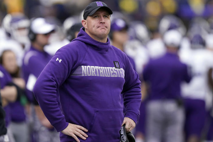 Then-Northwestern head coach Pat Fitzgerald stands on the sideline during a game against Michigan on Oct. 23, 2021, in Ann Arbor, Mich.