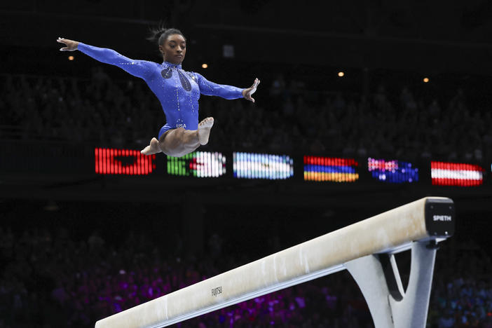 Simone Biles competes on the beam during the women's all-round final at the Artistic Gymnastics World Championships in Antwerp, Belgium, on Friday.