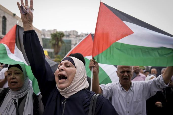 Palestinians attend a rally in support of Hamas and the Gaza Strip in the West Bank city of Nablus on Monday.