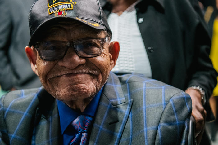 Hughes Van Ellis, one of the last known survivors of the Tulsa Race Massacre of 1921, has died at age 102. He's seen here smiling at a rally commemorating the 100th anniversary of the massacre in June 2021 in Tulsa, Okla.