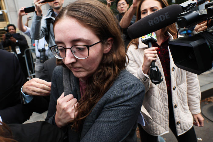 Caroline Ellison leaves federal court in Manhattan after testifying during the trial of former FTX CEO Sam Bankman-Fried on Oct. 10. Ellison said Bankman-Fried was the main decision-maker and steered her to transfer funds from cryptocurrency exchange FTX to Alameda Research, a financial firm she headed.