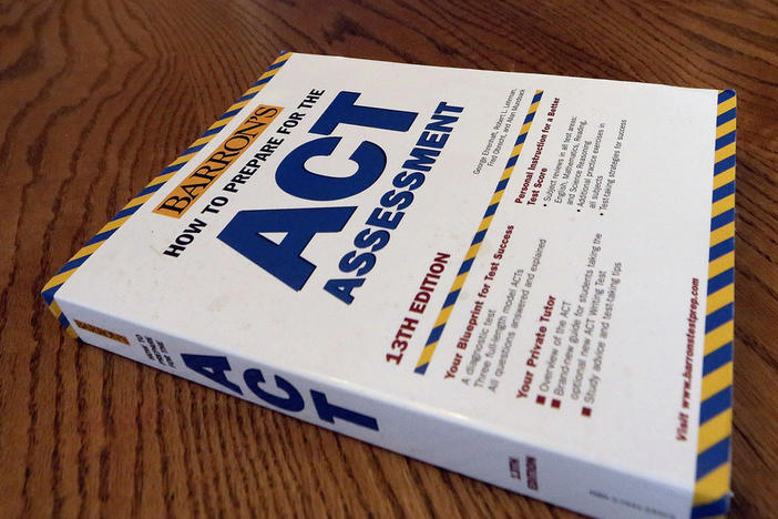 An ACT Assessment preparation book is seen in 2014 in Springfield, Ill. High school students' scores on the ACT college admissions test for 2023 dropped to their lowest in more than three decades, showing a lack of student preparedness for college-level coursework, the nonprofit organization that administers the test said Wednesday.