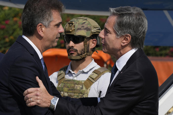 Israel's Foreign Minister Eli Cohen, left, welcomes U.S. Secretary of State Antony Blinken upon arrival at Israel's Ben Gurion Airport in Lod, on the outskirts of Tel Aviv, on Thursday.