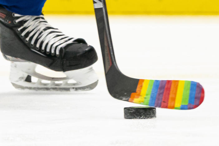 Pride Tape was quickly adopted by NHL teams as a way to support and celebrate LGBTQ+ fans and athletes. But the NHL has banned the tape. Here, a player used the tape on their stick for a pre-game warm up to celebrate a "Hockey is for Everyone" night in March 2021.