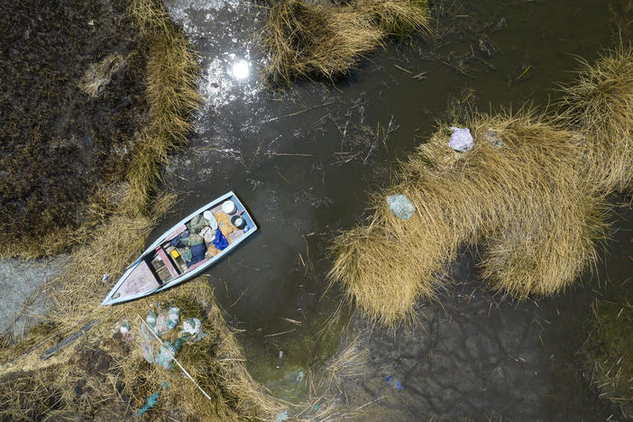 An aerial view of a stuck boat on a dried out lake in Bolivia. A new report finds that September 2023 was the hottest September on record. South America - which is coming out of its winter - also saw record high temperatures.