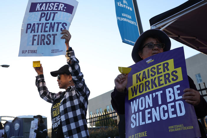 Striking Kaiser Permanente workers on the picket line in front of a hospital in Vallejo, Calif., on Oct. 6. A deal to avert another strike came together Friday.