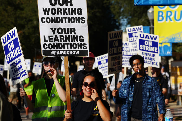 Union academic workers and supporters march and picket at the UCLA campus amid a statewide strike by nearly 48,000 University of California unionized workers on Nov. 15, 2022, in Los Angeles.