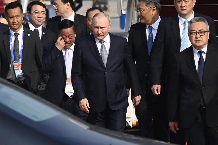 Russia's President Vladimir Putin, center, arrives at Beijing Capital International Airport to attend the third Belt and Road Forum in Beijing, Tuesday, Oct. 17, 2023.
