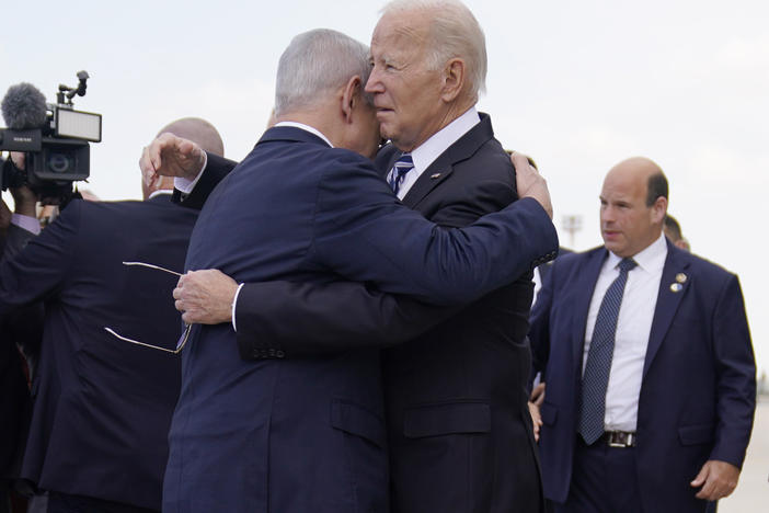 President Biden greets Israeli Prime Minister Benjamin Netanyahu at Ben Gurion International Airport on Wednesday, Oct. 18, 2023, in Tel Aviv.