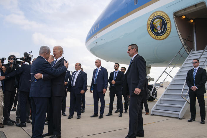 President Biden is greeted by Israeli Prime Minister Benjamin Netanyahu after arriving at Ben Gurion International Airport, Wednesday in Tel Aviv.
