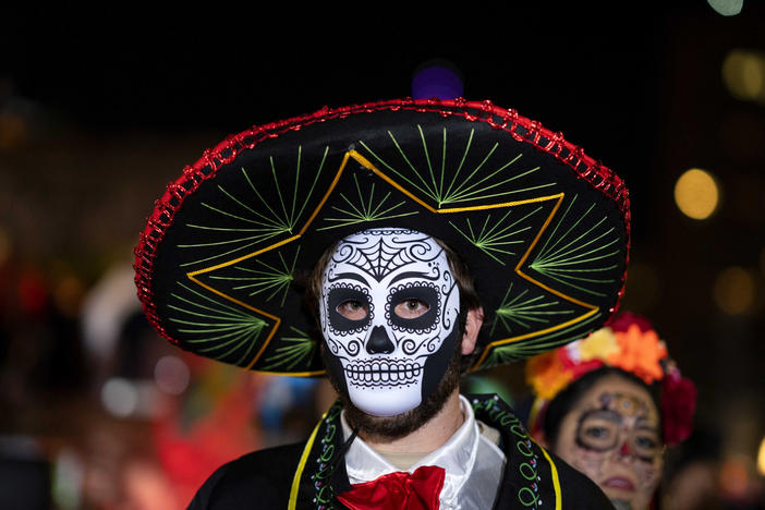 A Halloween reveler participates in New York City's 48th annual Greenwich Village Halloween Parade, Sunday, Oct. 31, 2021, in New York.