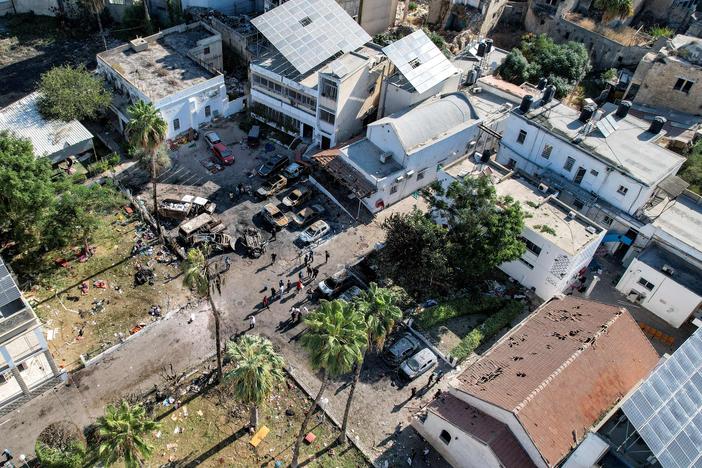 An aerial view of the complex housing the Ahli Arab hospital in Gaza City after an explosion on the hospital grounds that killed hundreds, according to Palestinian officials. Unraveling the facts behind the explosion has been made difficult because of swarms of social media accounts spreading false information about the explosion.