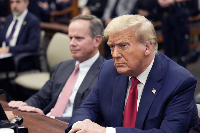 Former President Donald Trump sits in the courtroom with his legal team before the continuation of his civil business fraud trial at New York Supreme Court, Tuesday, Oct. 17, 2023, in New York.