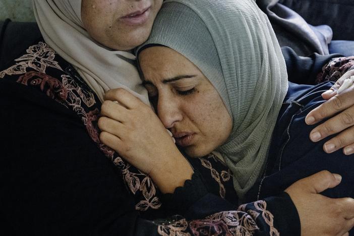 Sisters, wives, mothers, cousins of the village of Qusra gather to mourn those killed just days after the Hamas attacks in southern Israel.
