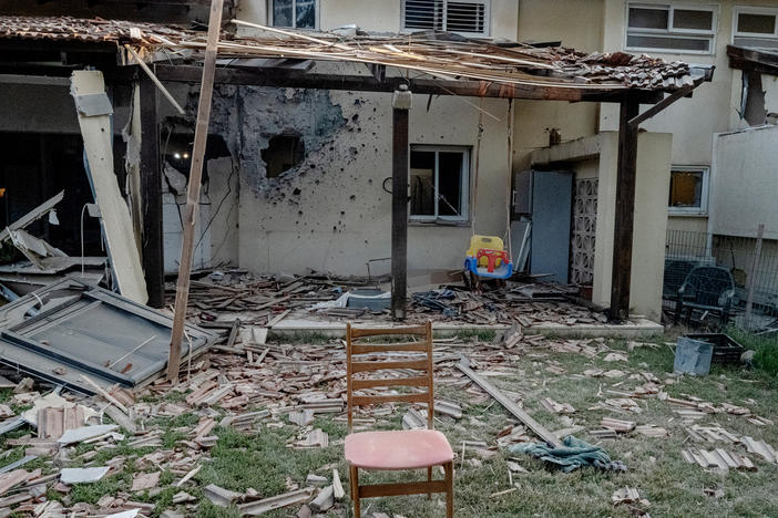 A house destroyed by Hamas in the Kfar Aza kibbutz in southern Israel about 3 miles away from the border with Gaza.