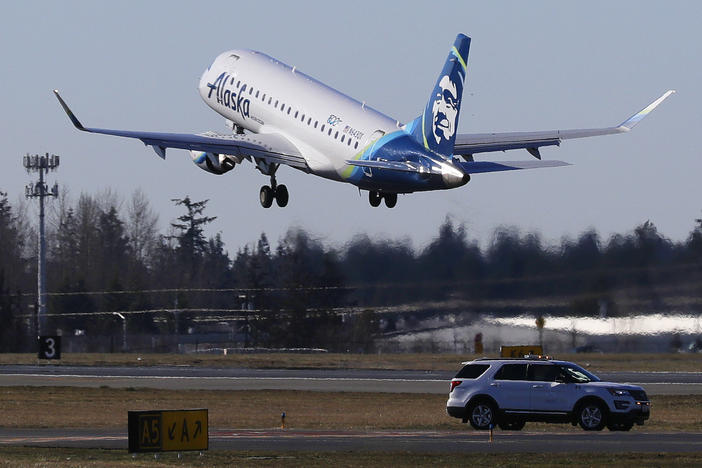 An Alaska Airlines Embraer 175 jet, similar to this one, was forced to make an unexpected landing Sunday night after an off-duty pilot who was riding in the cockpit allegedly attempted to disable the aircraft's engines.