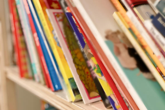 Scholastic says it will stop offering the controversial collection of race- and gender-related titles at middle school book fairs starting in January.