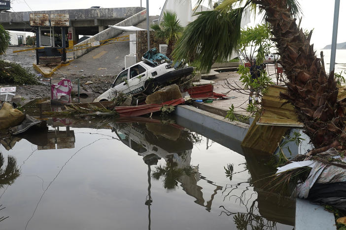 A street is strewn with debris on Wednesday after Hurricane Otis ripped through Acapulco, Mexico.
