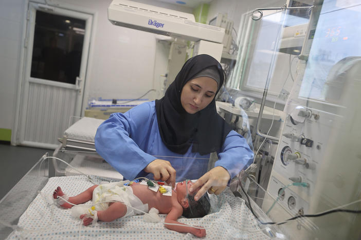 This newborn at Gaza's Nasser Hospital was delivered after their mother was killed in an Israeli airstrike on Oct. 24. The doctor said the baby is now in stable condition.