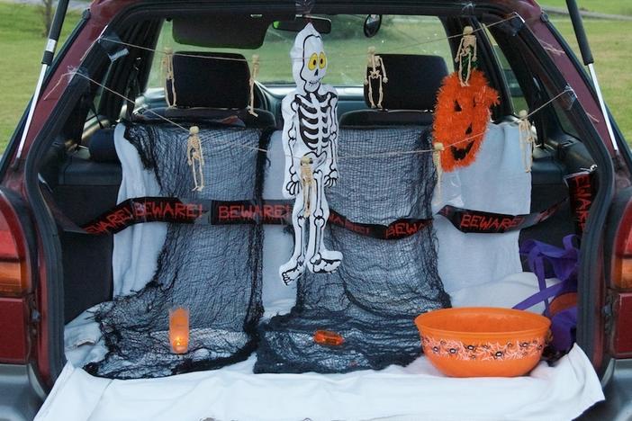 A car is open at a trunk-or-treat in 2014. The events allow children to collect candy from trunks of cars gathered in parking lots.