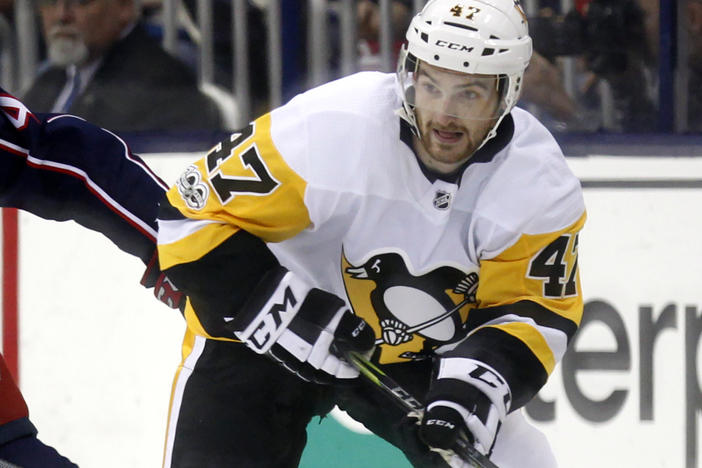 Former Pittsburgh Penguins forward Adam Johnson, 29, in action during an NHL hockey game in Columbus, Ohio, in 2017. Johnson died after a "freak accident" during a game in England on Saturday, Oct. 28, his club, the Nottingham Panthers said.